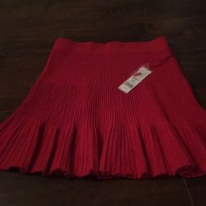 Red pleated skirt super cute for office or dinner